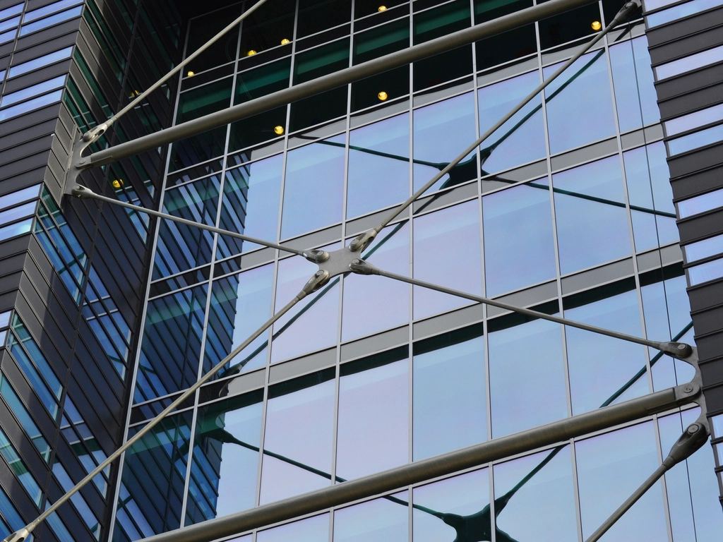 Representative image of a glass office building